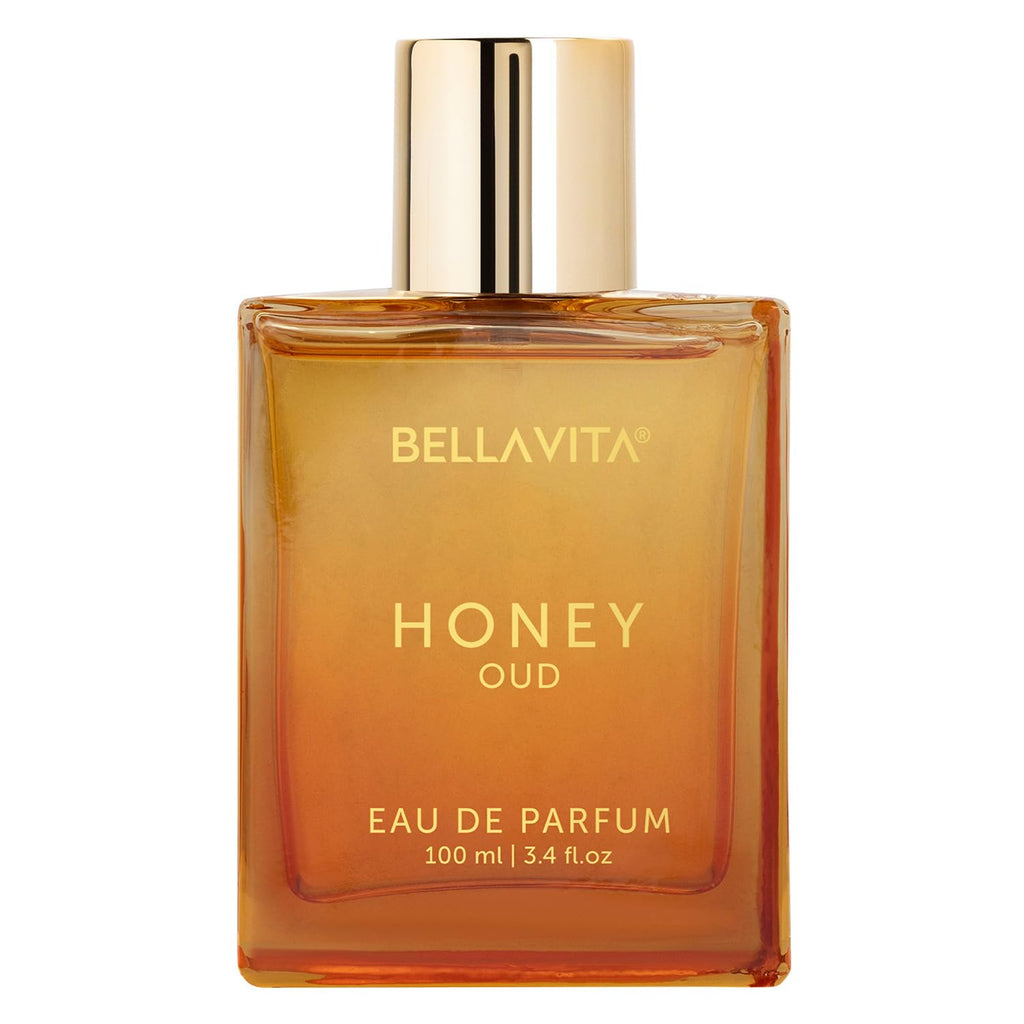 BellaVita Honey Oud amber fragrance bottle with gold cap on white